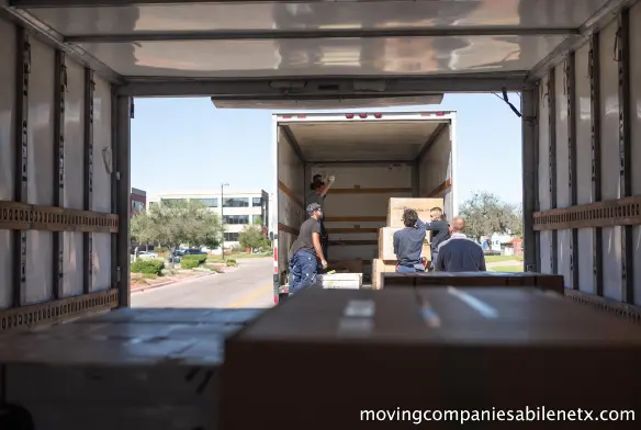 Professional movers assisting healthcare workers with relocation and moving services.