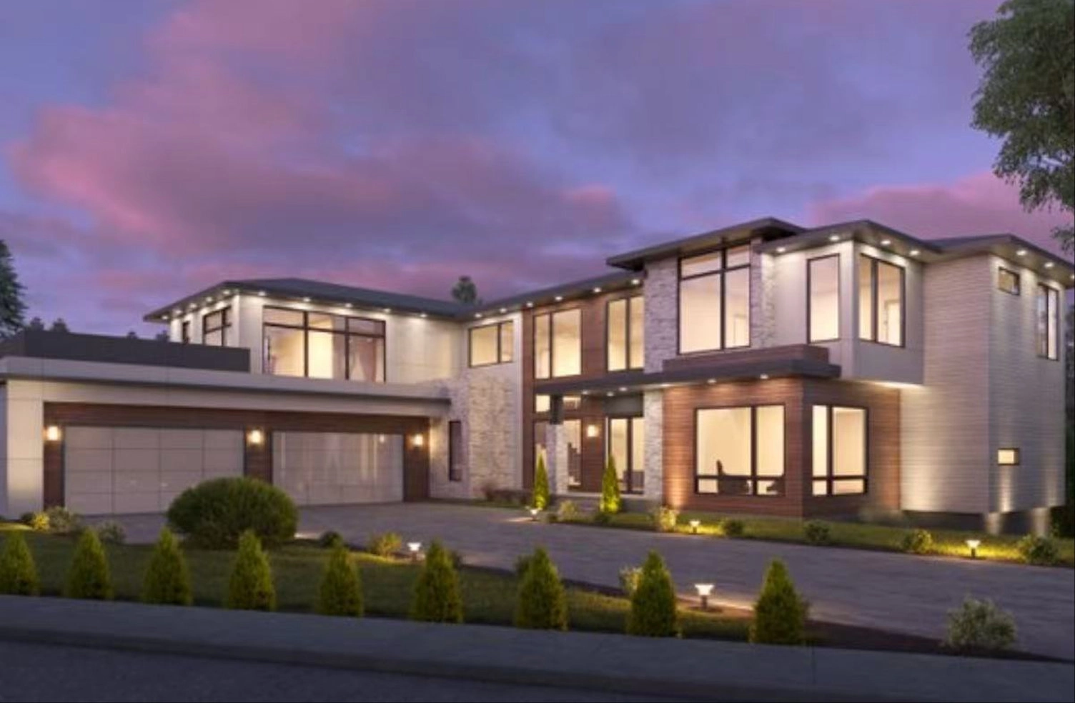 Luxury modern two-story house with exterior lighting at dusk.